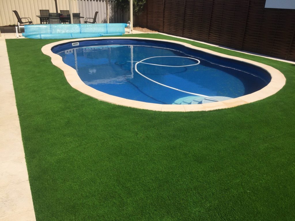 Artificial grass around the pool installation Wa turf gurus